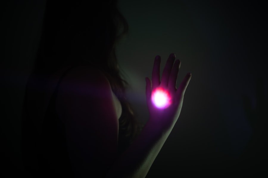 Womans hand with glowing light